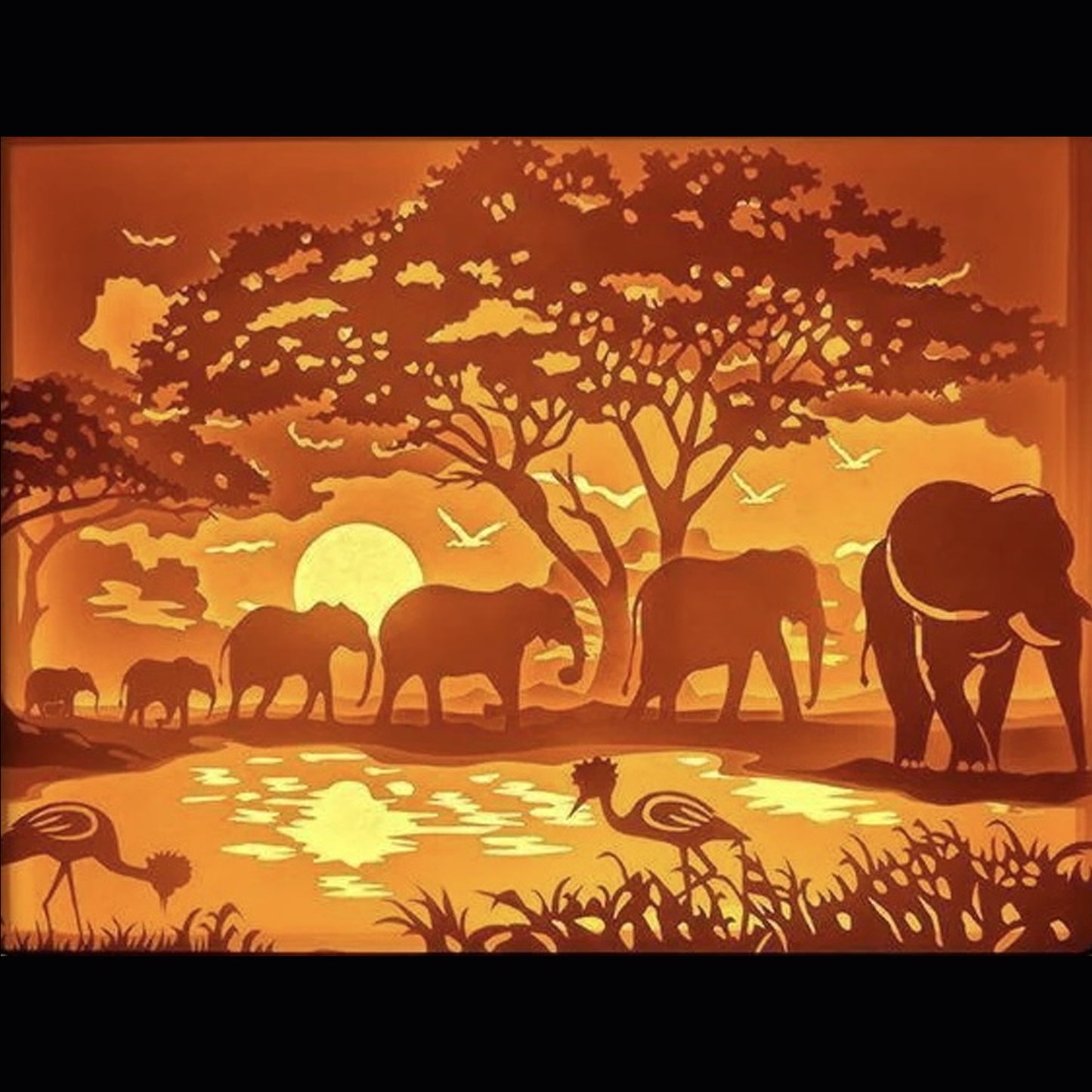éléphants sauvages, troupeau d’éléphants, éléphants en liberté, savane africaine, coucher de soleil, silhouettes éléphants, décor nature sauvage, animaux majestueux, éléphants famille, scène animalière, tableau lumineux éléphants, lightbox éléphants, shadowbox éléphants, papier découpé, décoration murale animaux, idée cadeau nature, déco éléphants, cadre lumineux savane, art lumineux éléphants