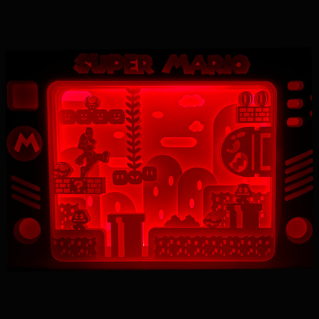 Mario Bros, Super Mario, Nintendo, Luigi, Mario 2D, jeu rétro, plateforme 2D, champignons, Goomba, Koopa Troopa, Bowser, princesse Peach, Yoshi, power-up, étoile invincible, tuyaux verts, jeu vidéo culte, univers coloré, aventure Nintendo, console NES, Super Nintendo, Switch, rétro gaming, personnage emblématique, tableau lumineux, lightbox, shadowbox, cadre lumineux, papier découpé, art lumineux, décoration murale, idée cadeau gamer, déco geek, cadeau fan Nintendo