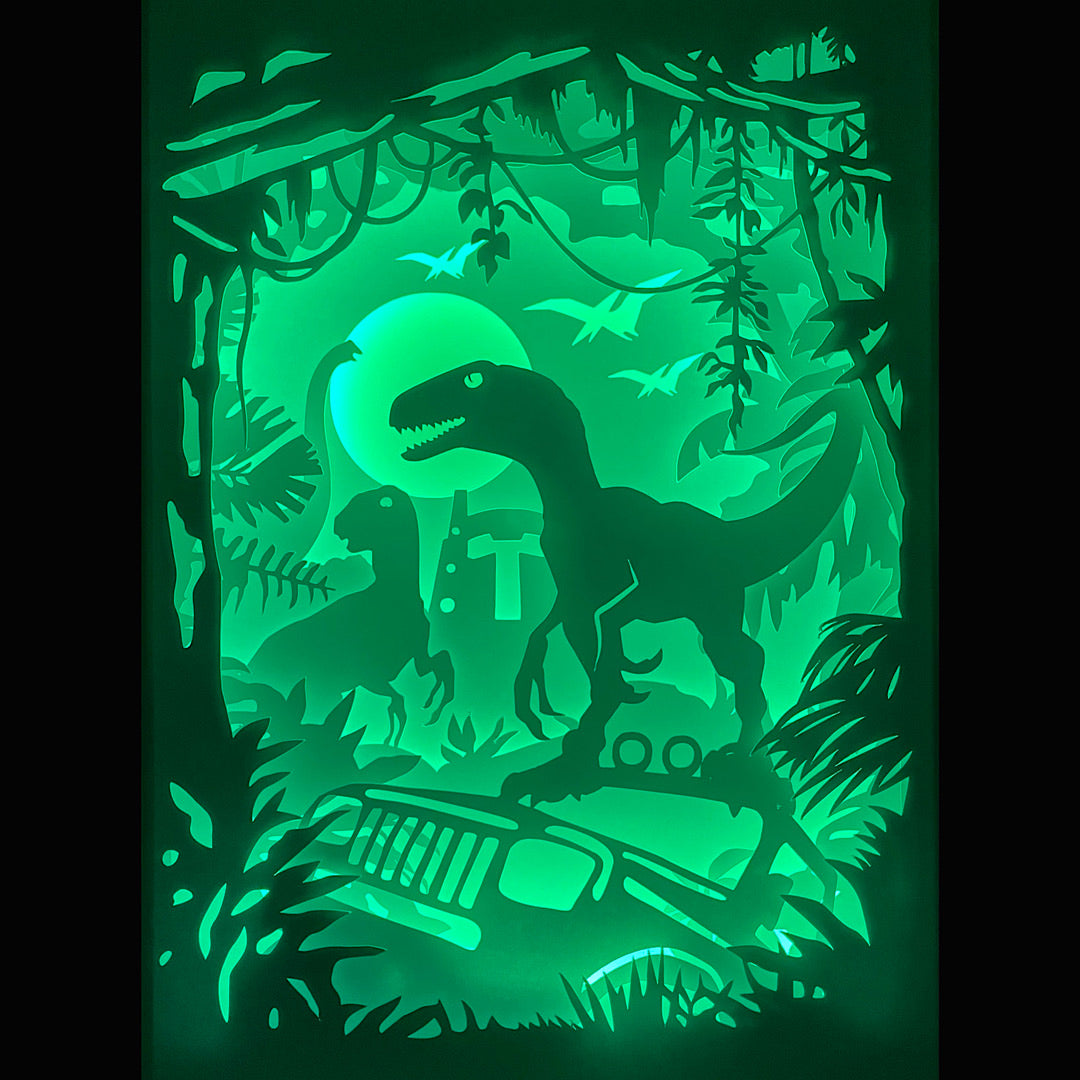 Jurassic Park, Jurassic World, Steven Spielberg, Universal Studios, dinosaures, T-Rex, vélociraptor, brachiosaure, parc d’attractions, île Nublar, film culte, saga Jurassic, aventure préhistorique, monde perdu, science-fiction, fossiles, créatures géantes, film légendaire, blockbuster, cinéma culte, tableau lumineux, lightbox, shadowbox, cadre lumineux, papier découpé, art lumineux, décoration murale, idée cadeau cinéma, déco geek