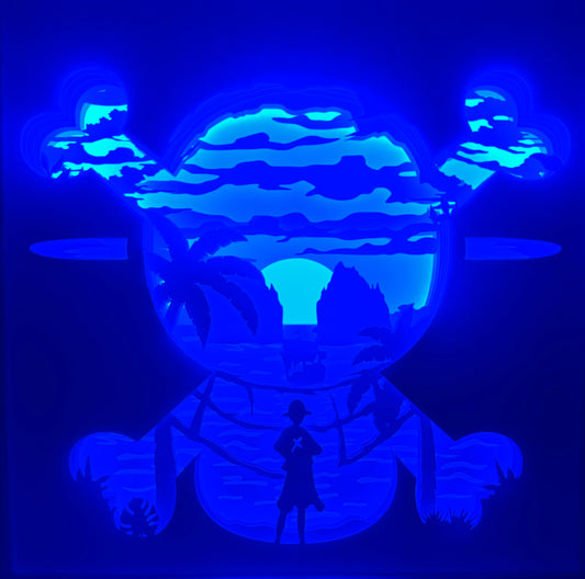 One Piece, Luffy, Monkey D Luffy, Mugiwara, Chapeau de paille, Gear 5, Grand Line, Thousand Sunny, aventure pirate, anime culte, manga pirate, Eiichiro Oda, univers One Piece, silhouette Luffy, coucher de soleil tropical, îles exotiques, tableau lumineux One Piece, lightbox anime, shadowbox manga, cadre lumineux pirate, décoration geek, papier découpé, idée cadeau otaku, décoration murale manga