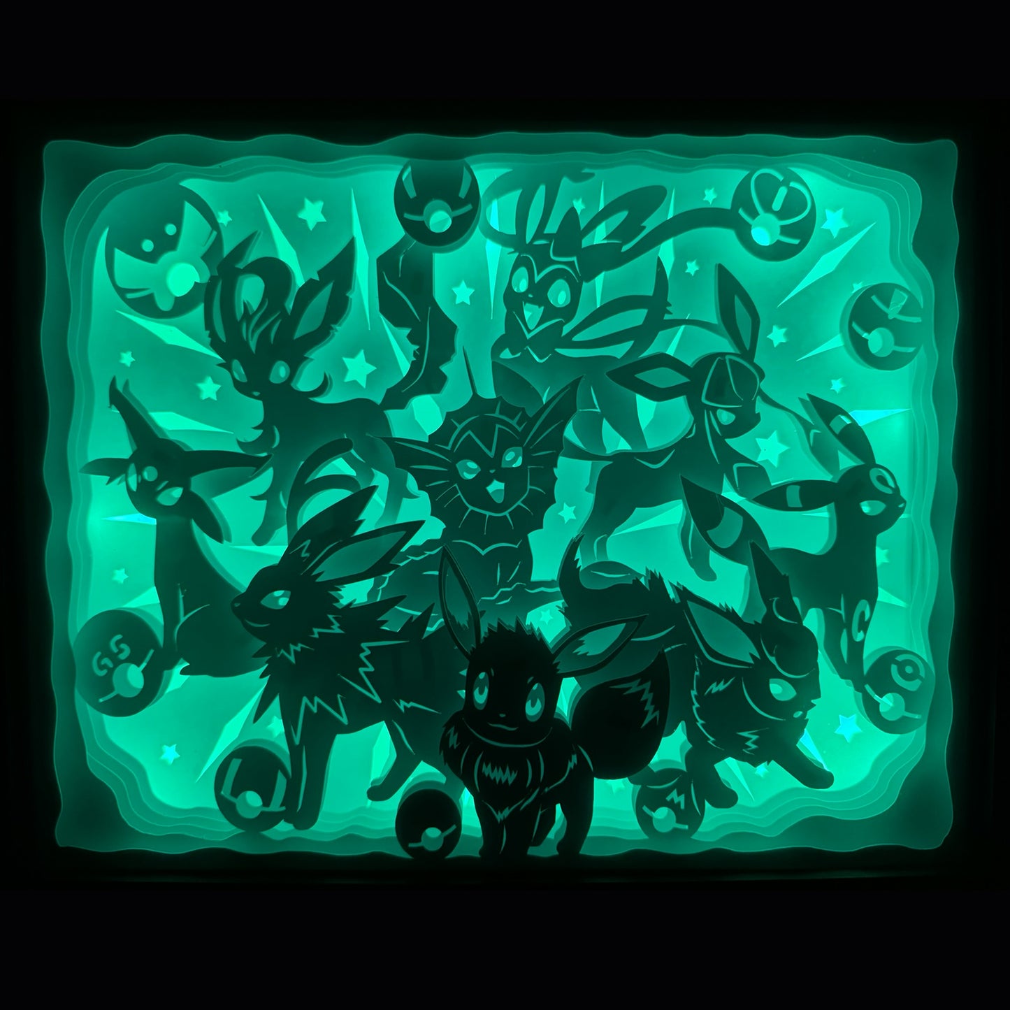 Pokémon, Pokemon, Évoli, Eevee, évolitions, Eeveelutions, Aquali, Vaporeon, Voltali, Jolteon, Pyroli, Flareon, Mentali, Espeon, Noctali, Umbreon, Phyllali, Leafeon, Givrali, Glaceon, Nymphali, Sylveon, évolution Pokémon, créature fantastique, manga culte, anime culte, jeu vidéo Pokémon, dresseur Pokémon, pokédex, univers Pokémon, tableau lumineux, lightbox, shadowbox, cadre lumineux, papier découpé, art lumineux, décoration murale, idée cadeau geek, cadeau fan Pokémon