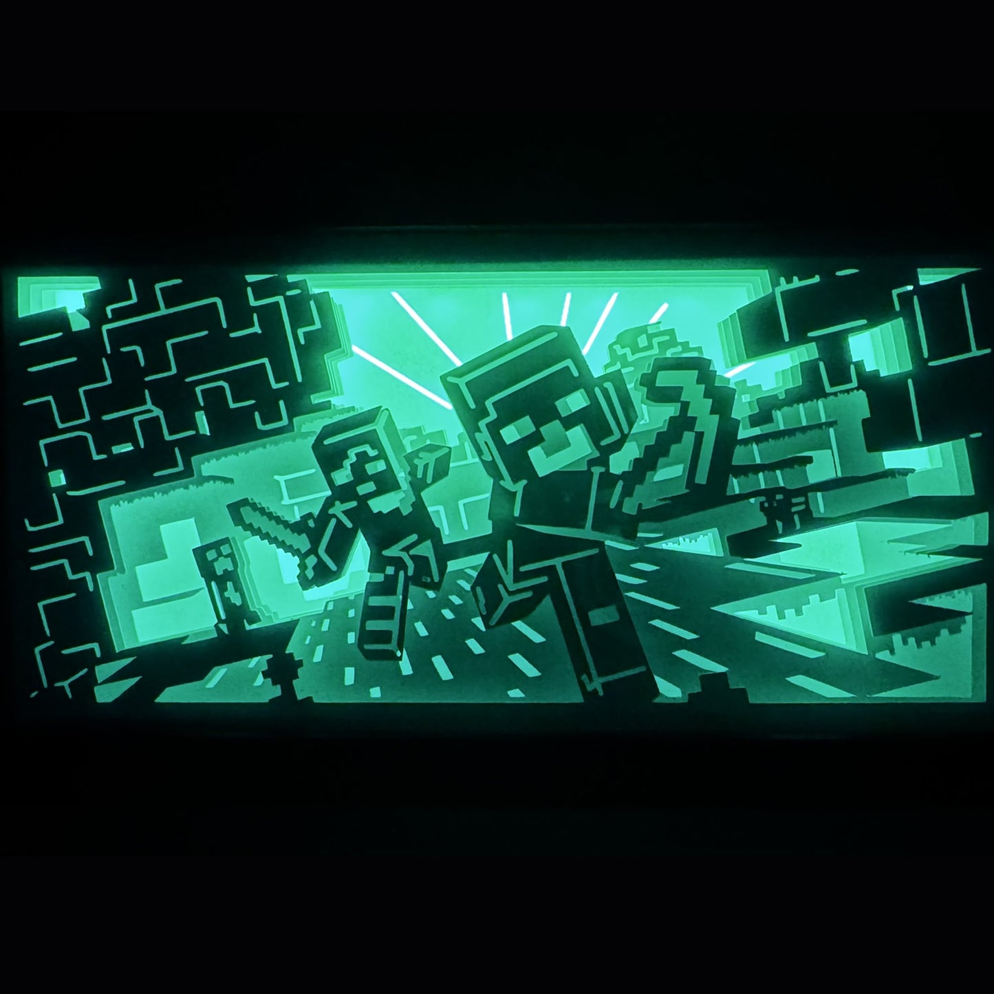 Minecraft, Mojang, jeu vidéo culte, sandbox, monde cubique, pixel art, creeper, Steve, Alex, Enderman, Nether, End, Redstone, blocs, construction, survie, aventure, multijoueur, univers créatif, jeu en ligne, jeu de rôle, jeu PC, consoles, tableau lumineux, lightbox, shadowbox, cadre lumineux, papier découpé, art lumineux, décoration murale, idée cadeau gamer, déco geek, cadeau fan Minecraft